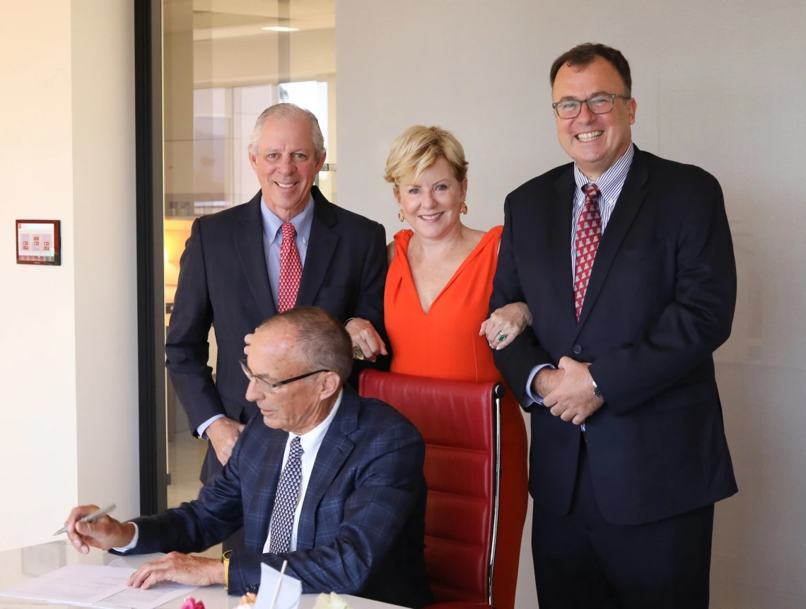 University of Arizona President Robert C. Robbins, Jacquelynn Dorrance and College of Humanities Dean Alain-Philippe Durand. Seated: Bennett Dorrance