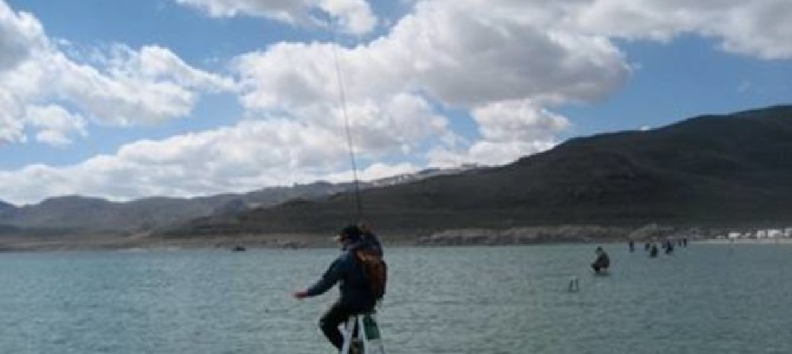 Zip lining over a lake